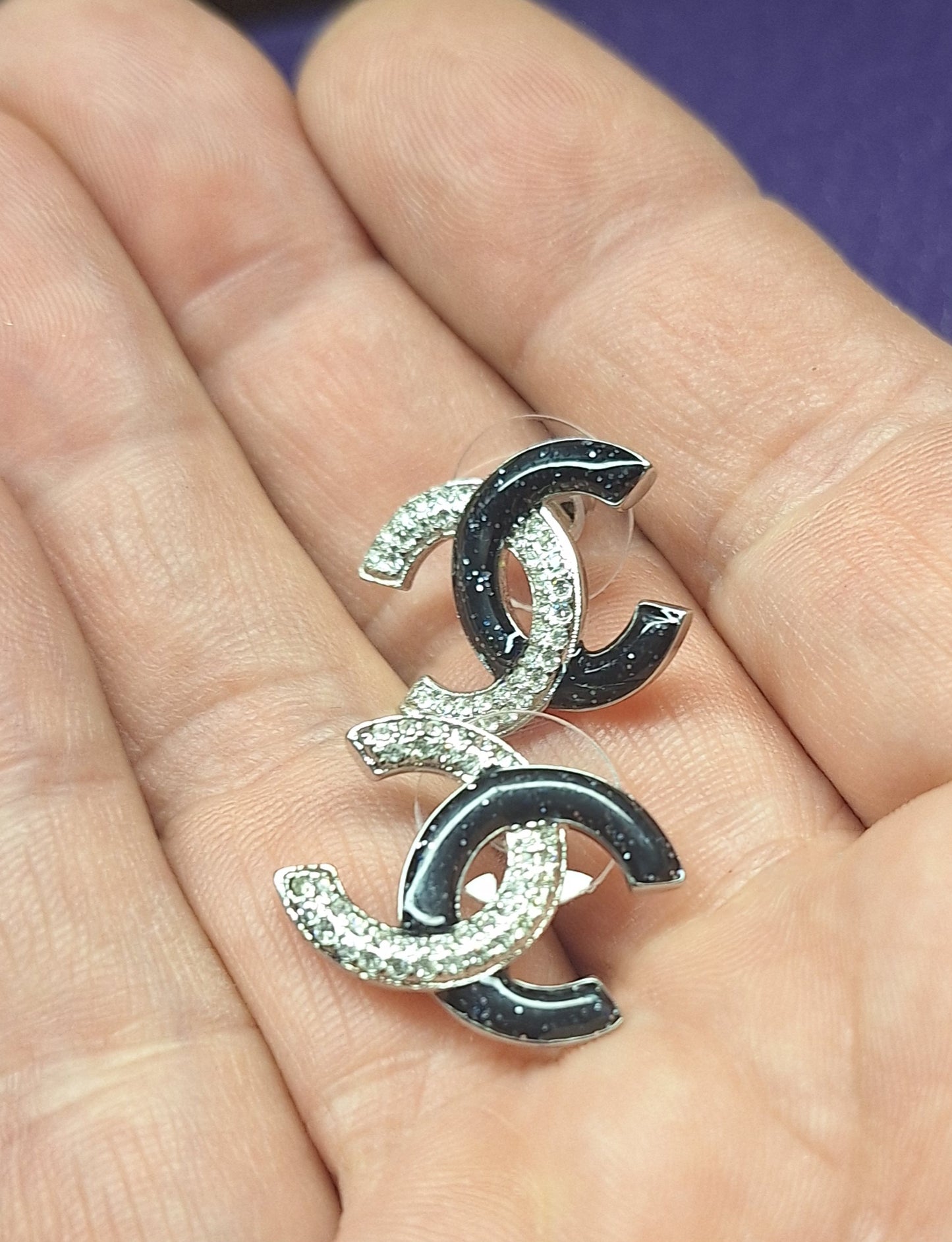 Earrings silver color and black brocade enemal and zircon. Stamped. 16/20 mm