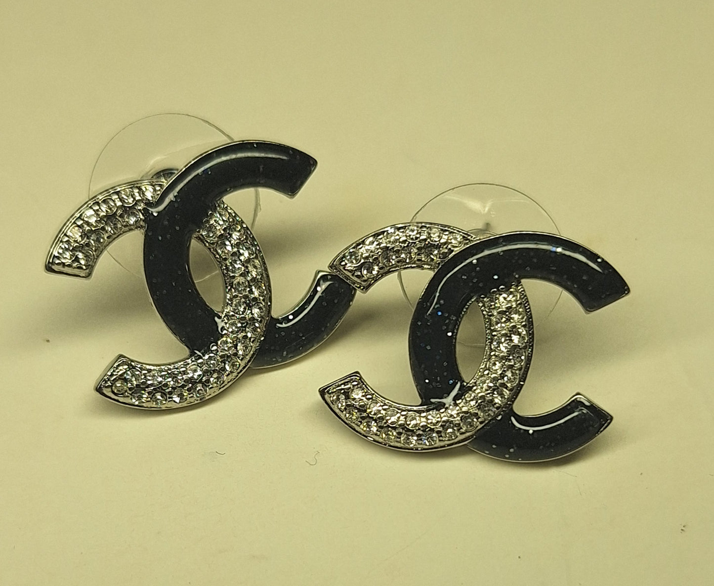 Earrings silver color and  black brocade enemal and zircon. Stamped. 16/20 mm