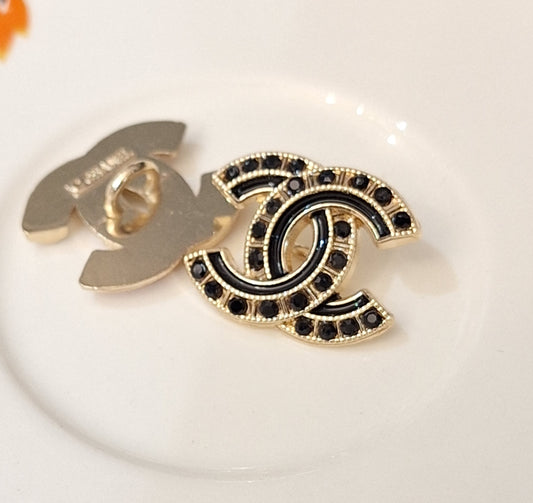 Buttons stamped,Gold, black zircon, black enemal. 18/22 mm