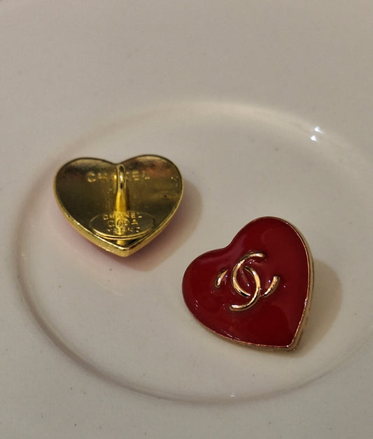 Buttons stamped. Gold & red. 16 mm