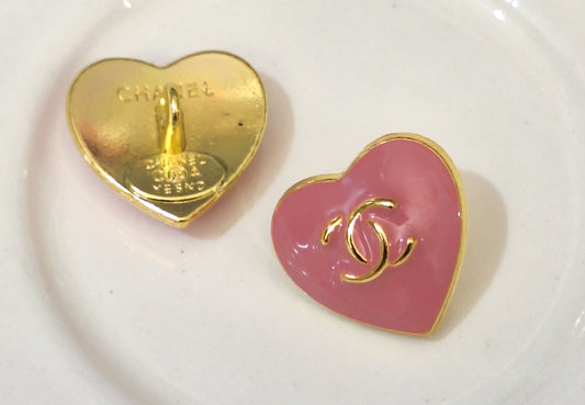 Buttons stamped. Gold & pink. 16 mm