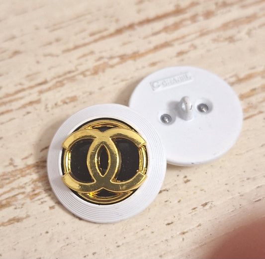 Buttons stamped, white, Gold & black. 24 mm