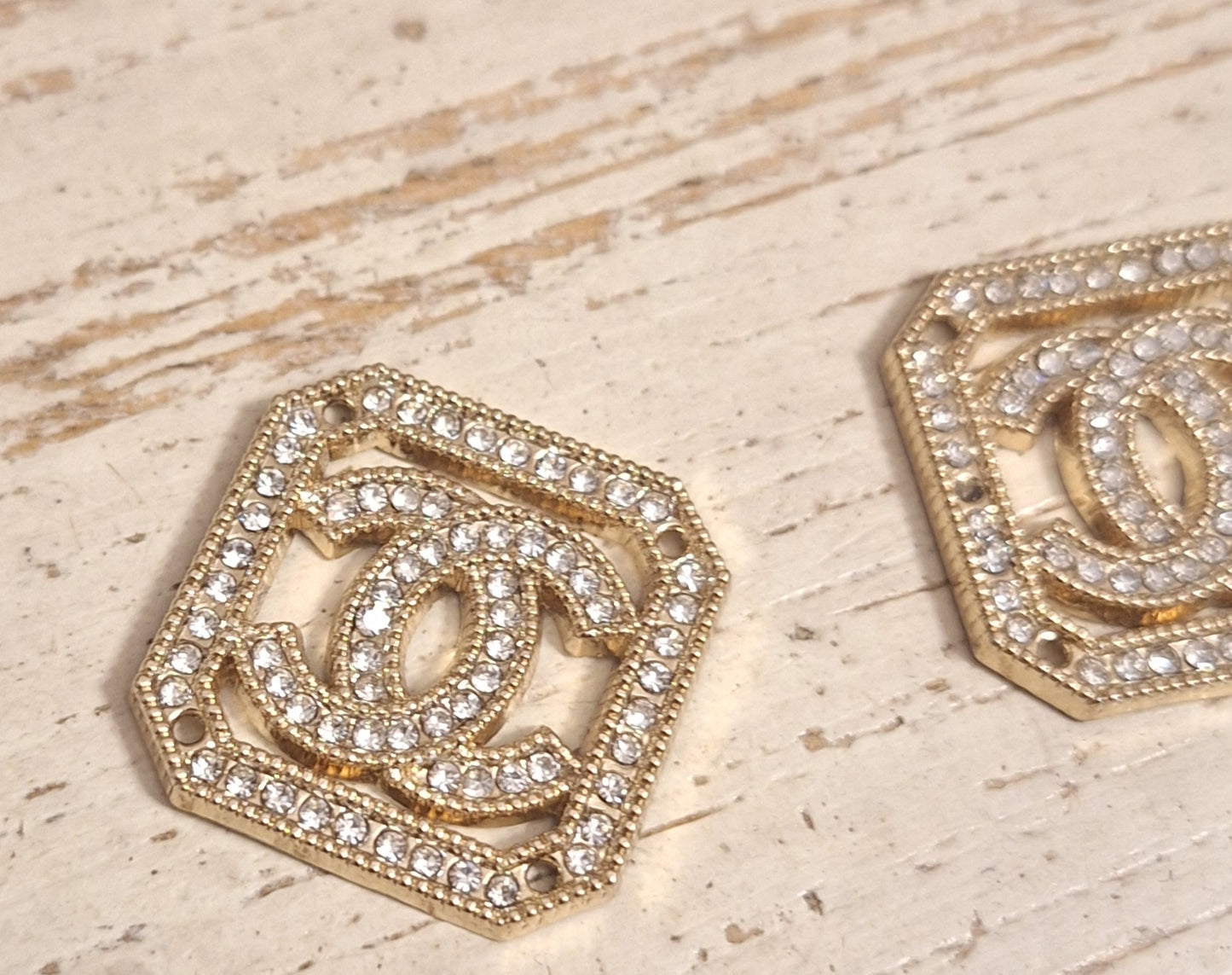 Tab, buttons - gold and zircon. 25 mm