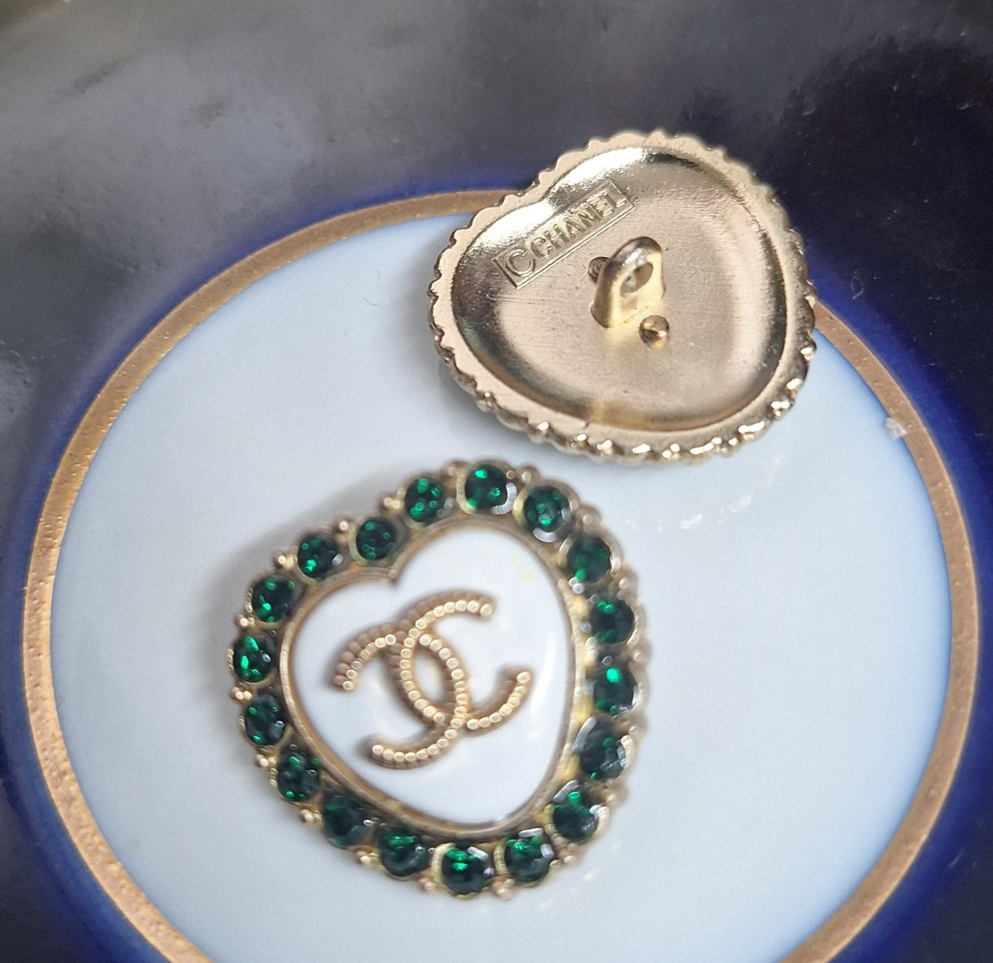 Buttons stamped -  gold, white & gren zircon. 23 mm