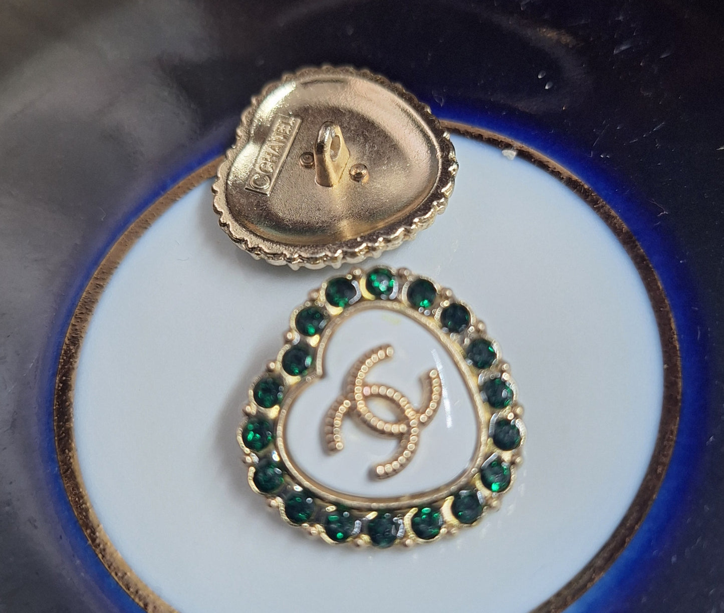 Buttons stamped -  gold, white & gren zircon. 23 mm