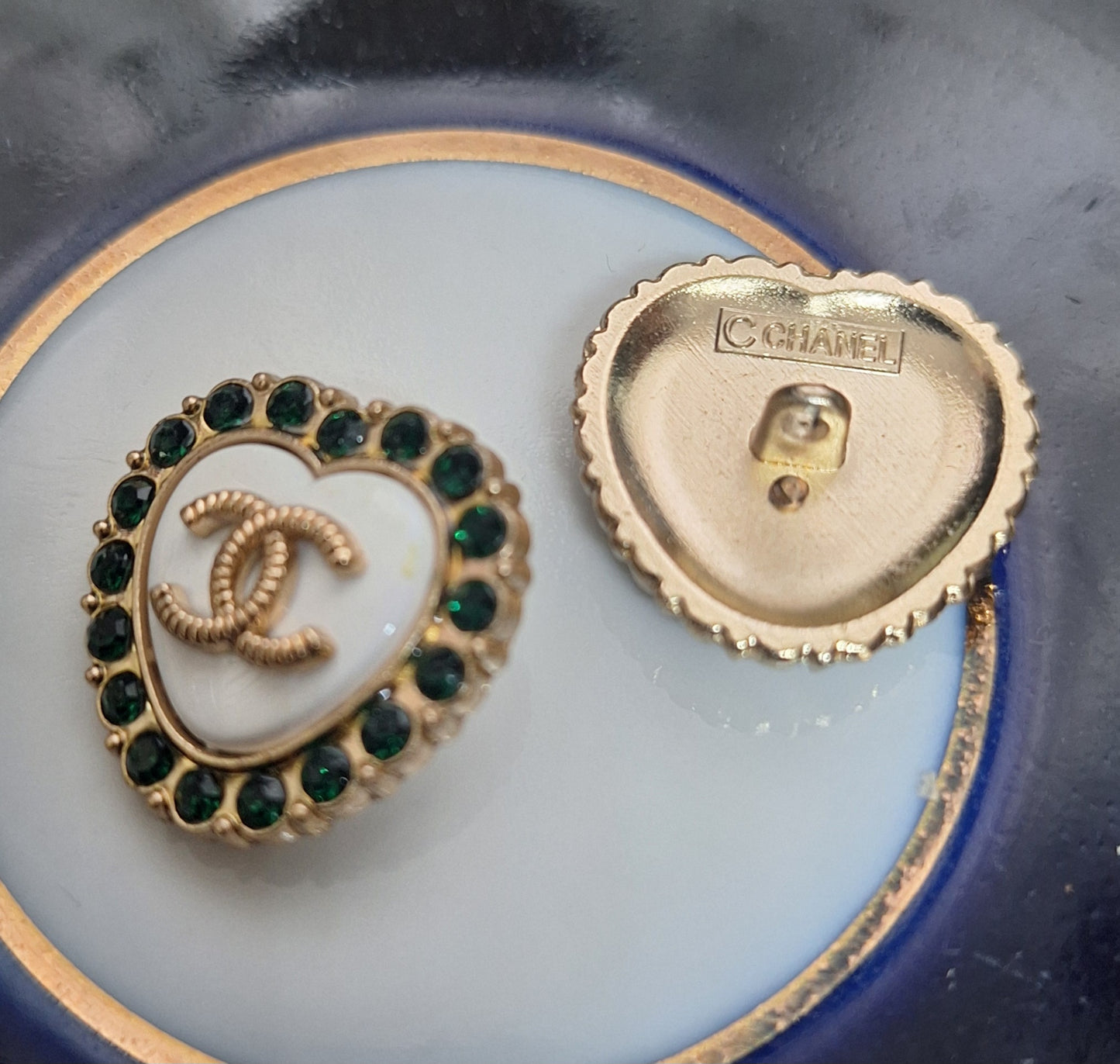 Buttons stamped -  gold, white & gren zircon. 23 mm