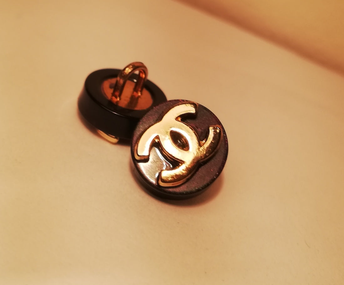 1 Buttons black & gold 10 mm