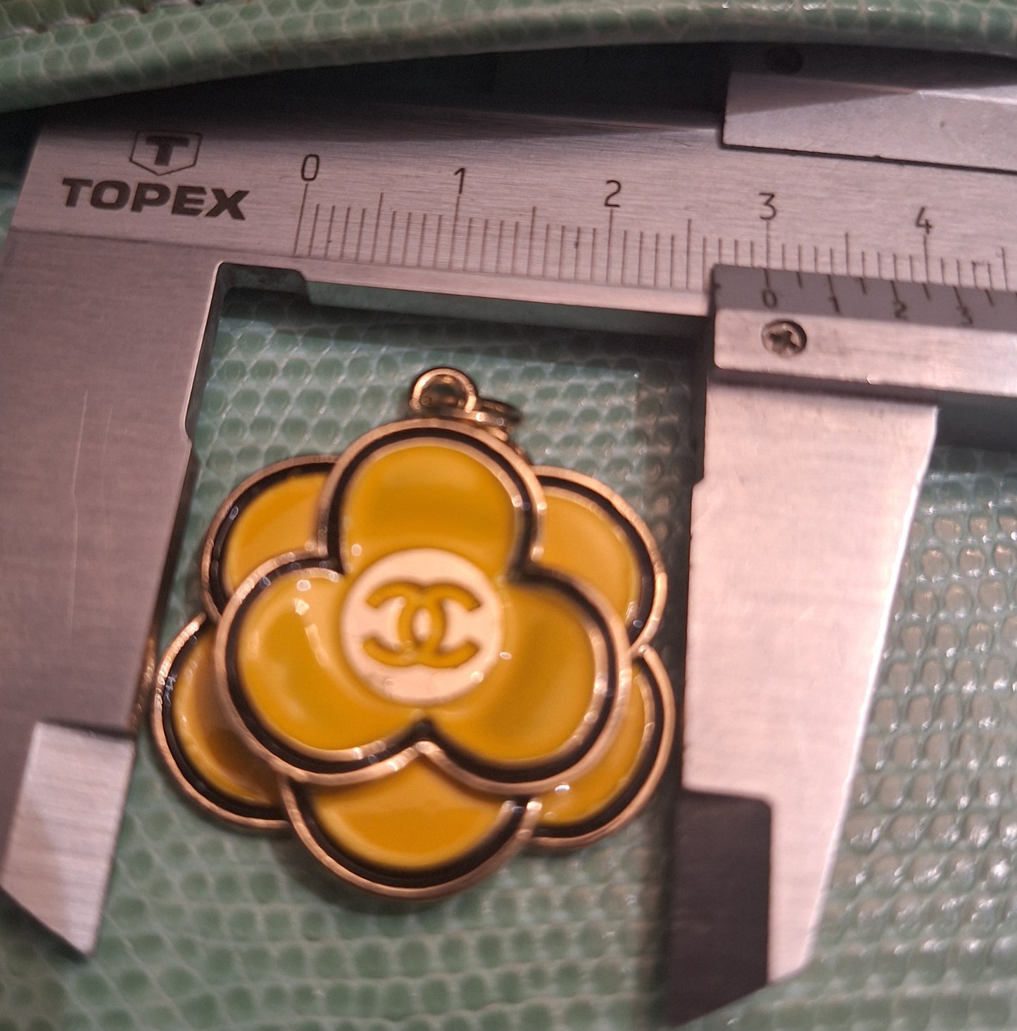 Pendants gold yellow black stamped 30 mm