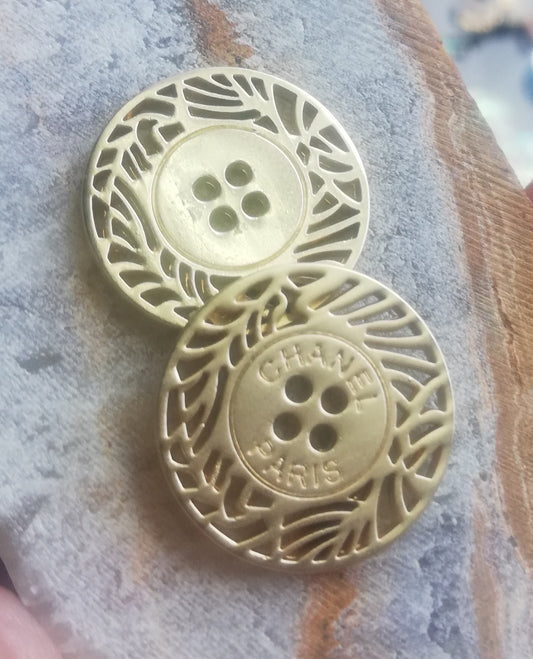 1 buttons gold 20 mm