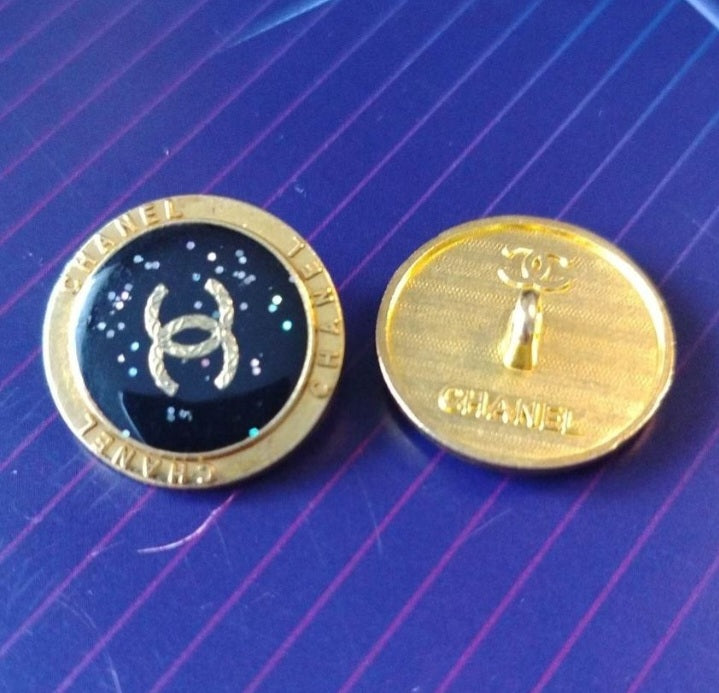 1 buttons gold & black glitter 23 mm