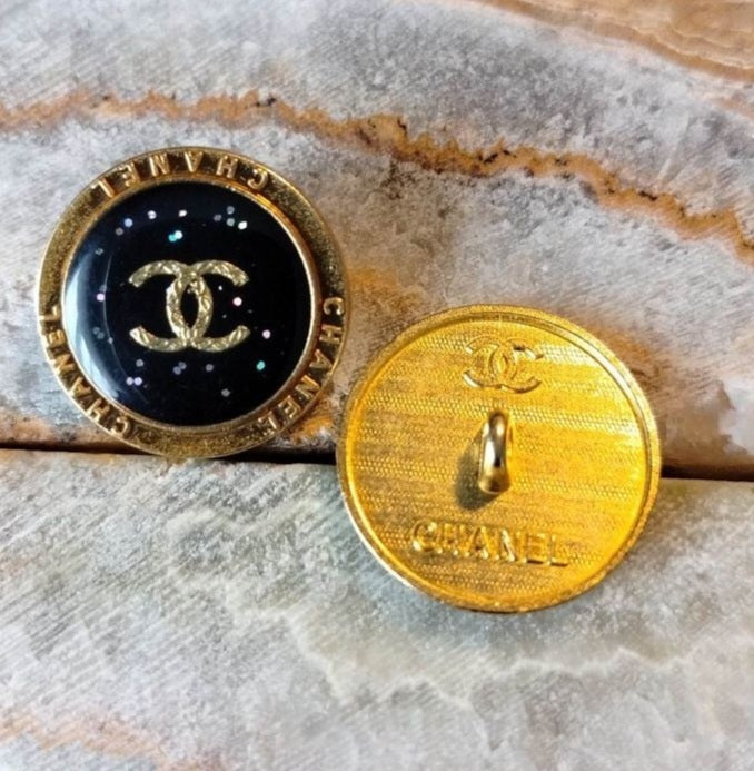 1 buttons gold & black glitter 23 mm