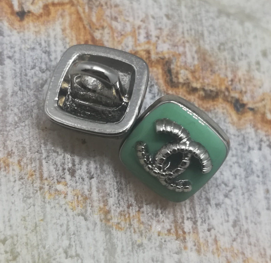 1 Buttons silver&green 9 mm